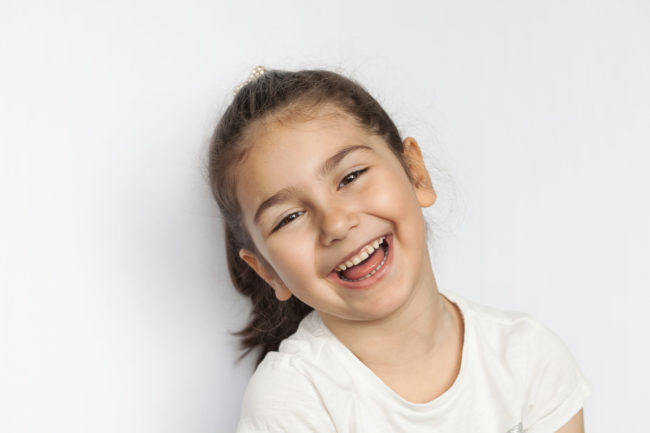 Portrait,Of,A,Happy,Laughing,Child,Girl